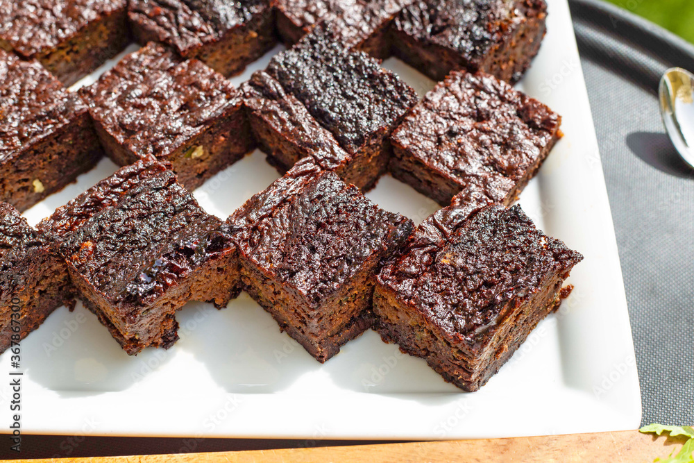 Brownie cake pieces in white plate Brownie cake pieces in white plate