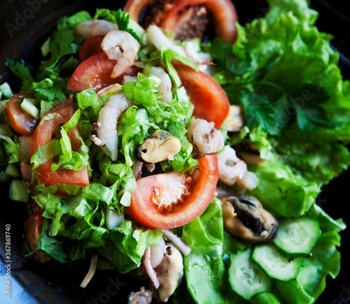 delicious salad with seafood close up picture