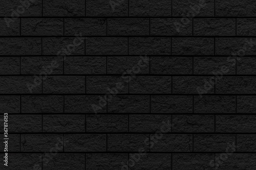 Exterior black granite building wall texture and seamless background