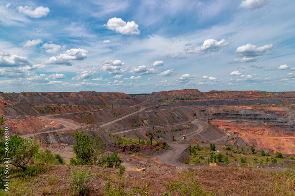 Ukraine, Krivoy Rog, the 16 of July 2020. Unique mine site with multi colored fossil fuels situated within city limits.