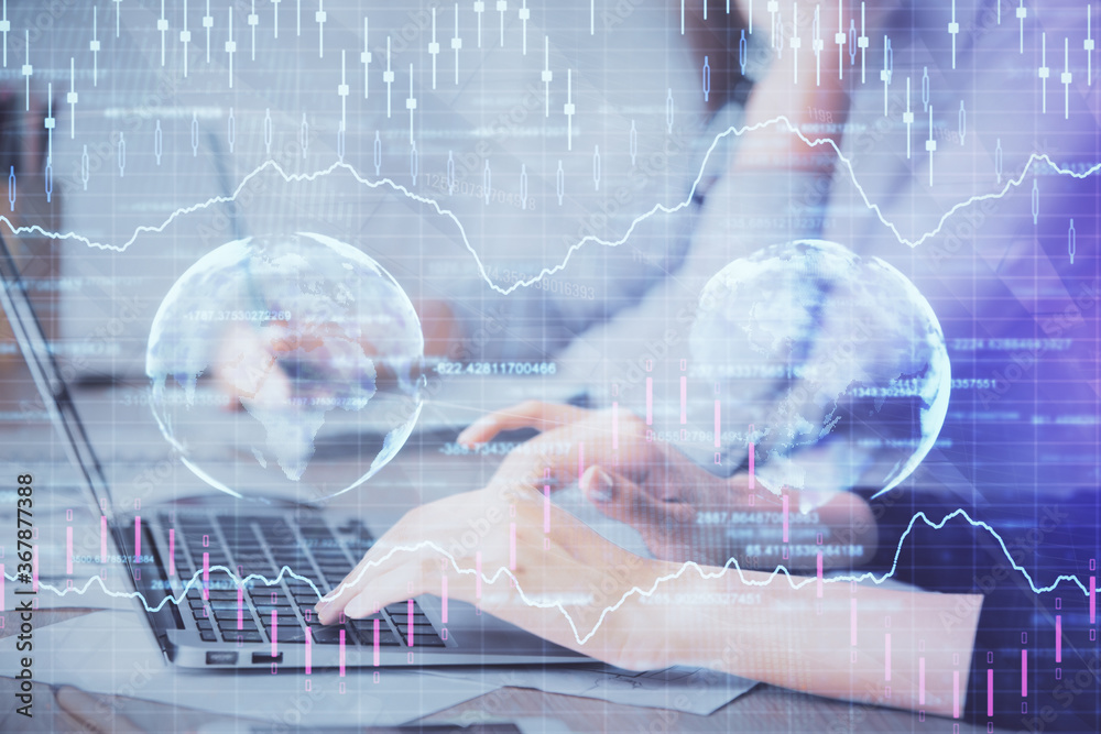 Multi exposure of woman hands typing on computer and financial chart hologram drawing. Stock market analysis concept.