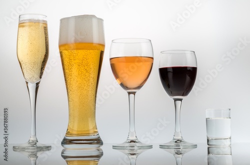 Champagne Glasses and Drinks on Grey Background
