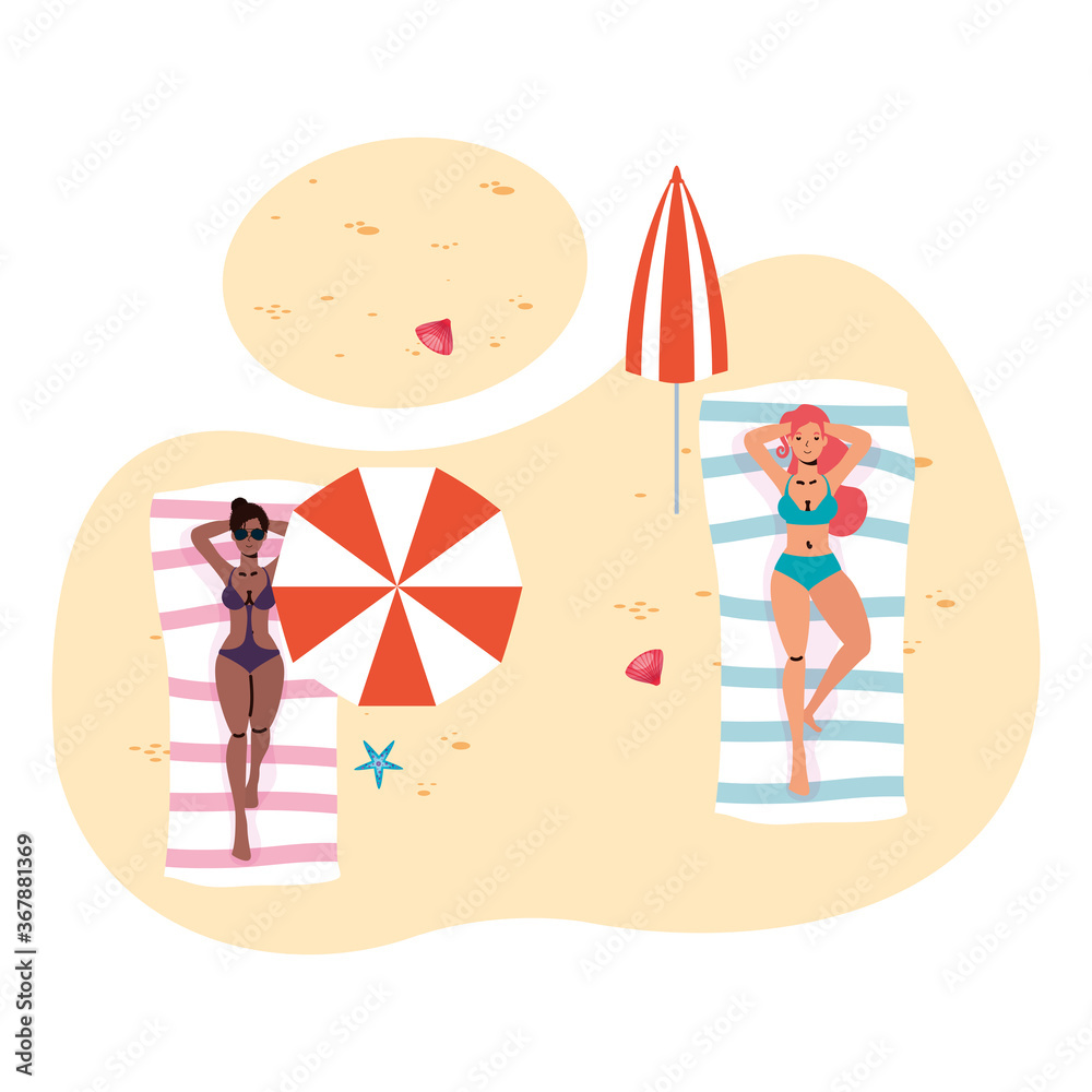 interracial women on the beach practicing social distance