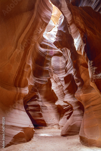 Upper Antelope Canyon in Page, Arizona with sunlight hitting the bottom 