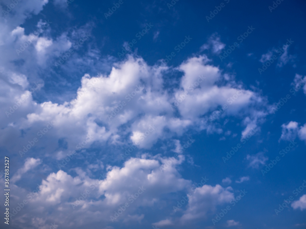 Blue sky and  Fluffy clouds for background.