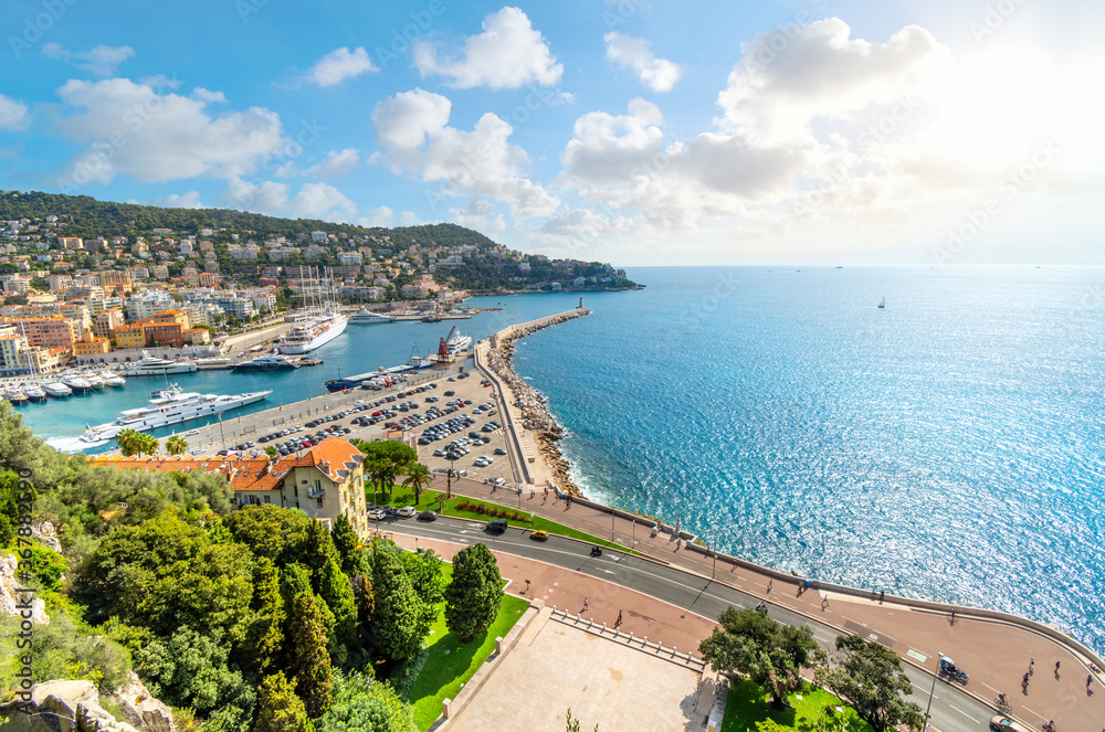 View from atop Castle Hill overlooking The Mediterranean Sea, promenade and the old harbor and port on the French Riviera, in Nice France.
