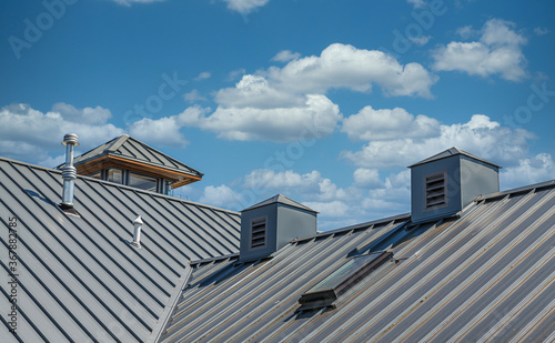 Ribbed Metal Roof Under Blue Skies