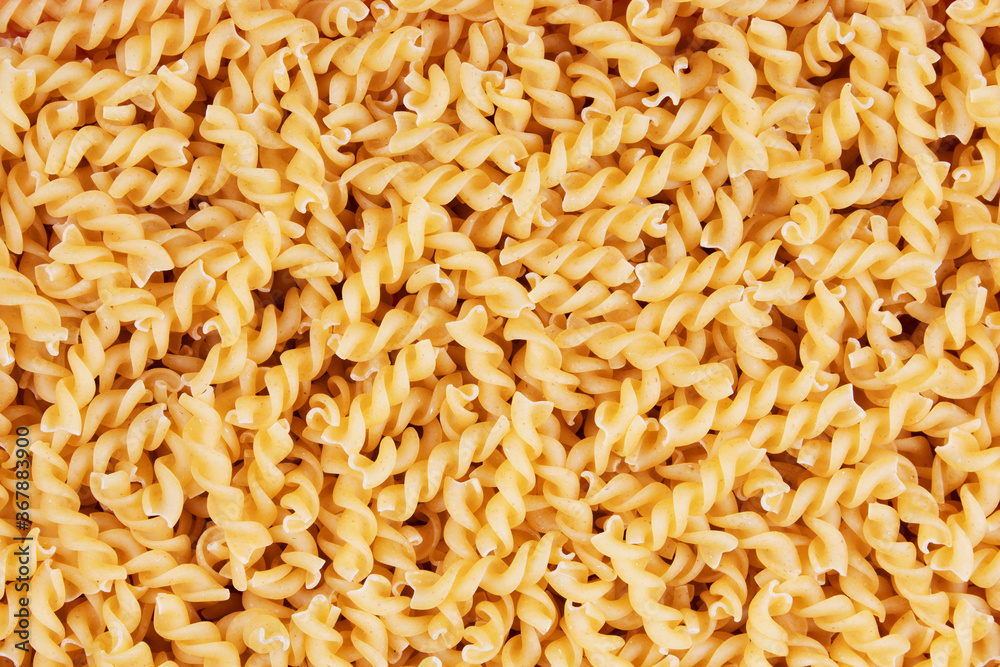 Close up of dry uncooked Fusilli pasta