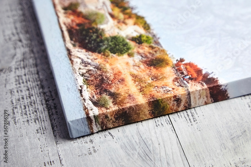 Wallpaper Mural Canvas print on wooden background. Wrapped canvas, edge, corner, closeup Torontodigital.ca