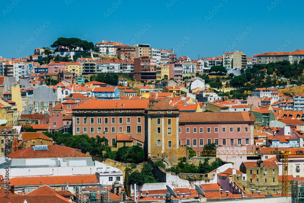 Panoramic view of historical buildings in the downtown area of Lisbon, the hilly coastal capital city of Portugal and one of the oldest cities in Europe