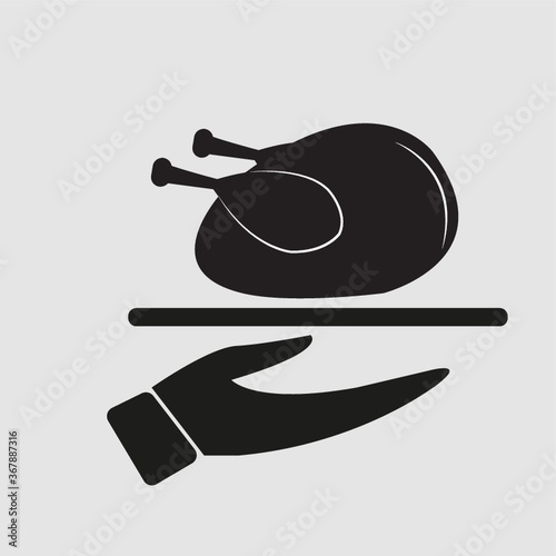 silhouette of cooked chicken on serving plate