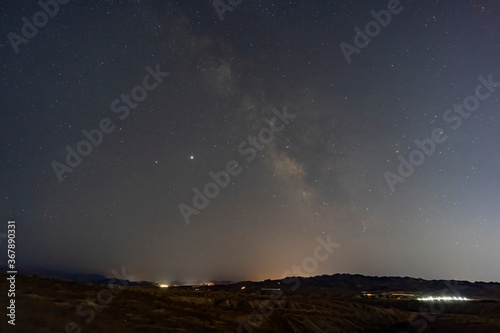 Night starry sky with a beautiful milk way over Lake Mead