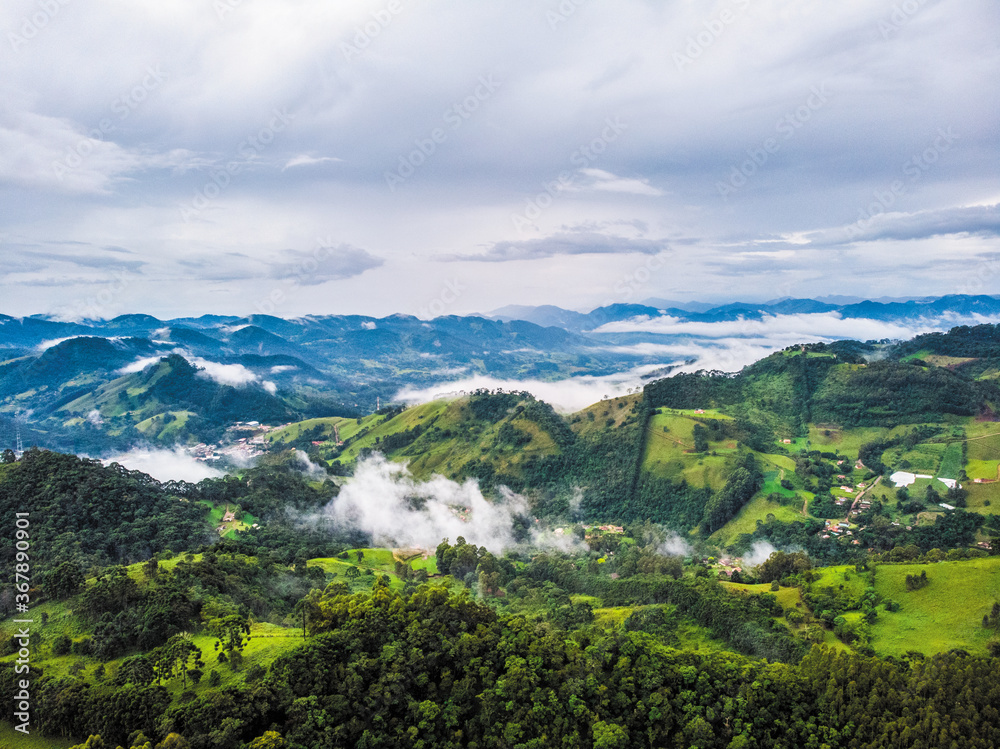 Naklejka premium mountain landscape with clouds