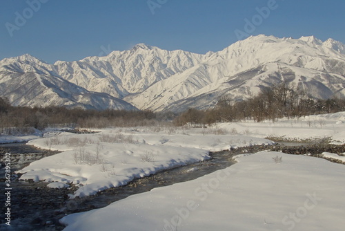 Daytime shot of snowed mountains in northern alps of Japan, Hakuba
