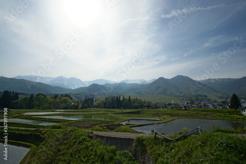 Spring has come in countryside of Japan, mountains and rice fields in Hakuba 