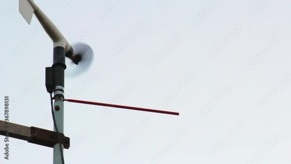 Windy weather stations windmill spinning in the wind Windy weather stations windmill spinning in the wind