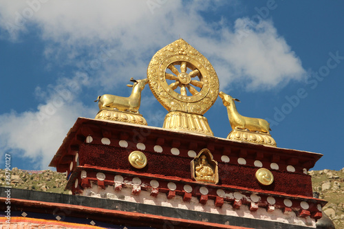 Golden deers with dharmacakra on the top of roof at Sera Monastery in Lhasa, Tibet, China photo