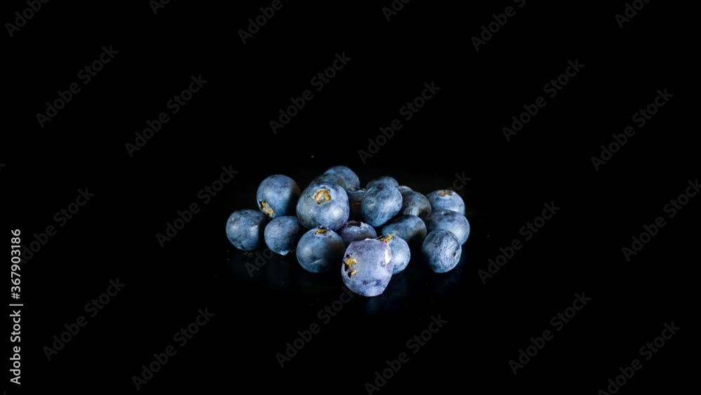 Blueberries Dehydrating In The Studio - Plain Black Background - timelapse Blueberries Dehydrating In The Studio - Plain Black Background - timelapse