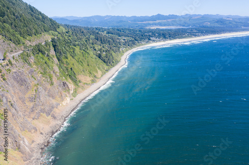 The cold water of the Pacific Ocean meets the rugged coastline of Oregon just north of the town of Manzanita. Everyone in Oregon has free coastal access due to the Oregon Beach Bill of 1967.