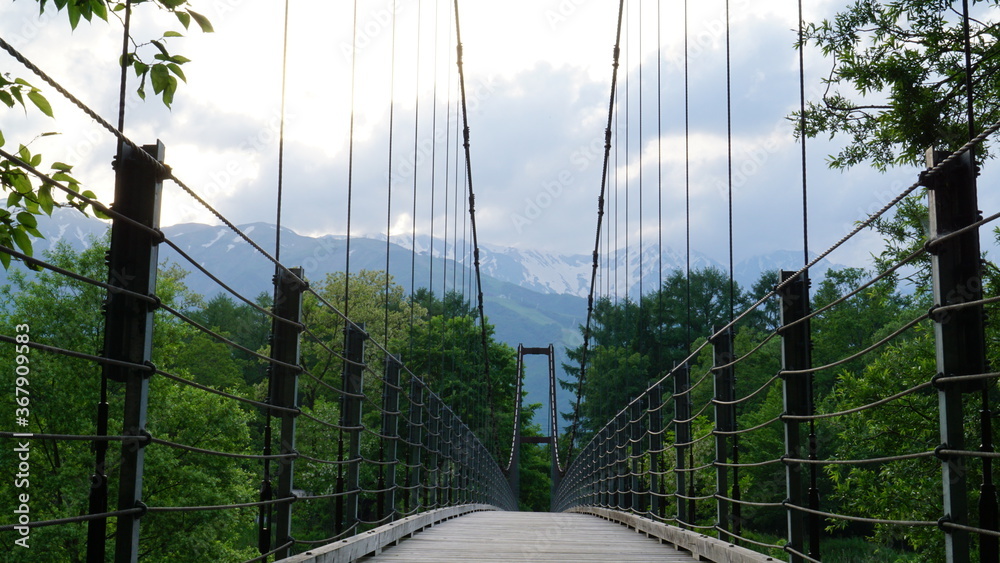 Obraz premium SUMMER, beautiful nature landscape from the wooden bridge in the northern alps, Japan, Hakuba