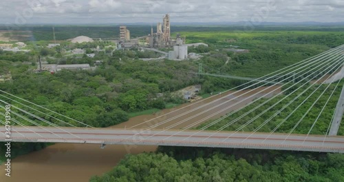 Flight over the higuamo river overlooking the cement factory in san pedro de macoris photo