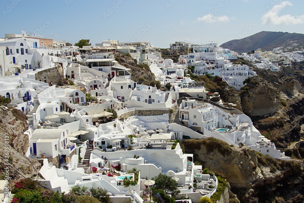 The landscape with beautiful buildings houses in santorini island in Oia, Greece, Europe The landscape with beautiful buildings houses in santorini island in Oia, Greece, Europe