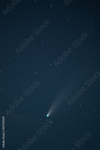 Neowise Comet ( C/2020 F3 )in cloudy night sky at , grain image