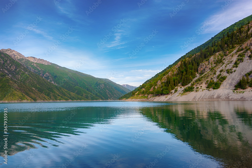 Beautiful mountain turquoise color lake Karasuu. Kyrgyzstan.