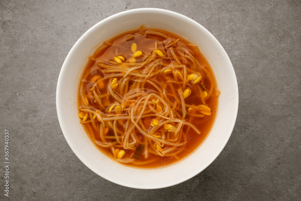 Bean sprouts soup on white background