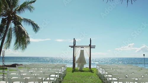 White wedding dress reveal on Hawaiian coastline. Cinematic camera movement. Olowalu Maui. 