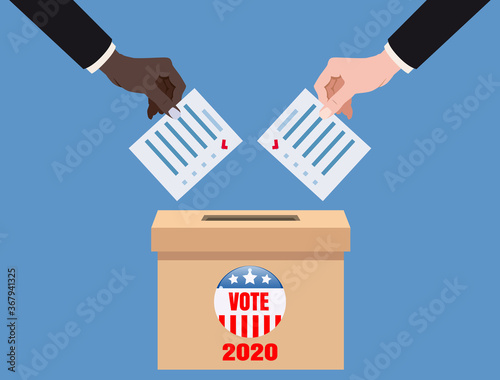The US presidential election 2020. Hands putting voting blancs papers in vote box