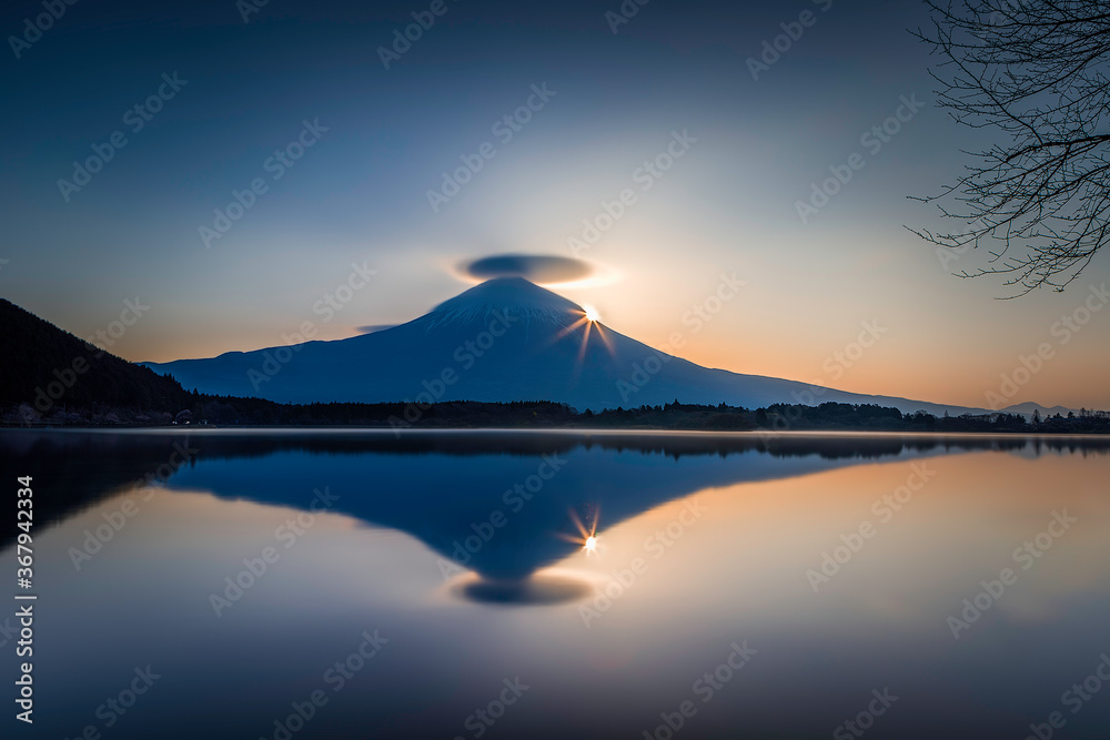 sunrise over lake and sunstar at Mount Fuji