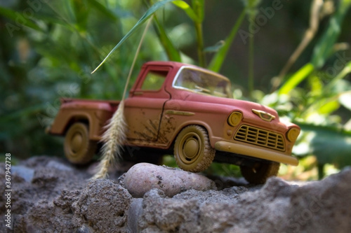 Fototapeta Naklejka Na Ścianę i Meble -  Toy car on the ground