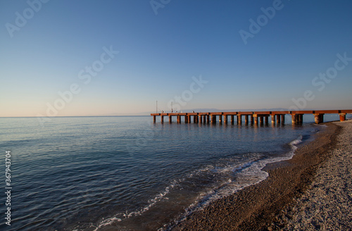 Fototapeta Naklejka Na Ścianę i Meble -  Seascape view with pier in the early morning