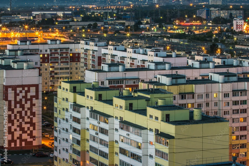 View from above of the roofs of contemporary block of flats. Ulyanovsk residential district at night, Russia. View from above of the roofs of contemporary block of flats. Ulyanovsk residential district at night, Russia.