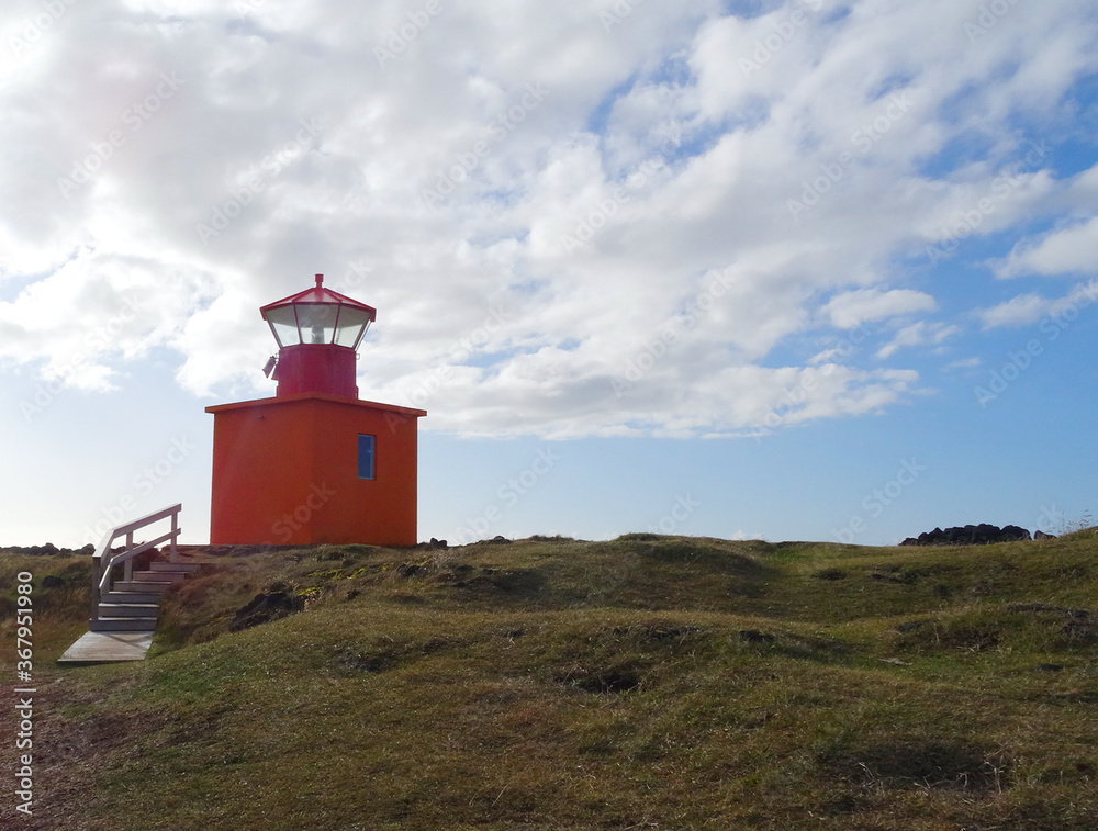 Landscape in Iceland. Lighthouse Skalasnagi on Snaefellsnes peninsula in Iceland. Orange lighthouse.