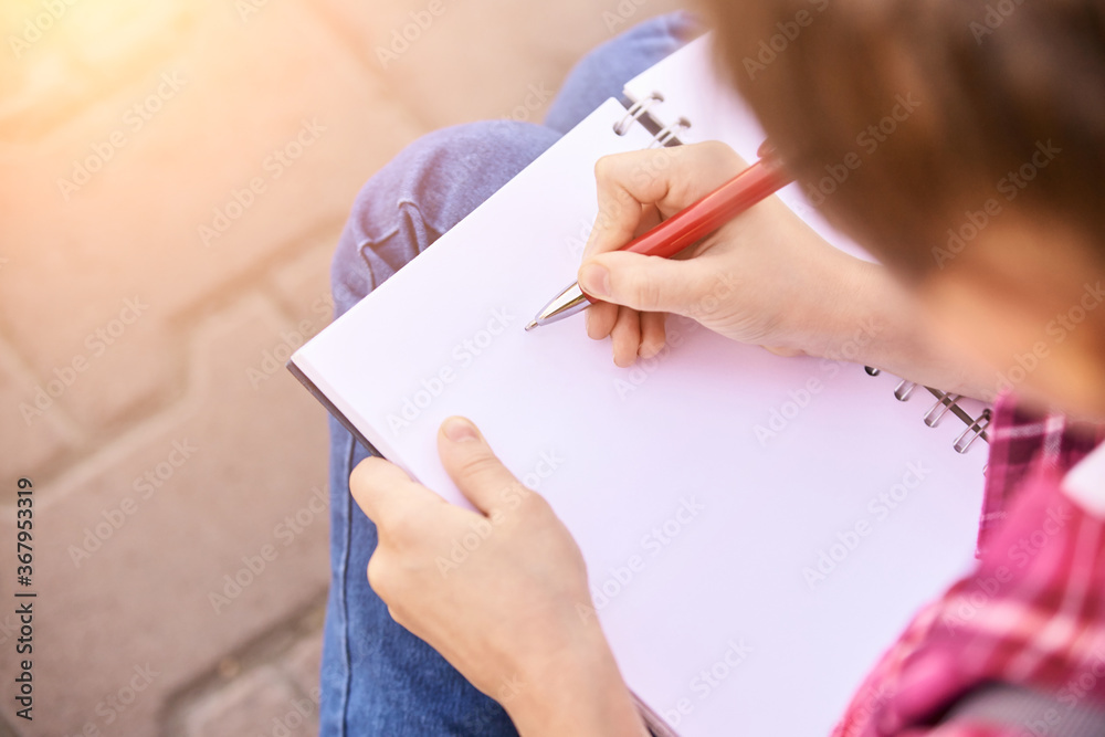 Little girl drawing. Homemade routine. School lessons. Write pen on piece of paper. Kindergarten study. Elementary preschool. Woman kid student. Thinking or dreaming. Close up Little girl drawing. Homemade routine. School lessons. Write pen on piece of paper. Kindergarten study. Elementary preschool. Woman kid student. Thinking or dreaming. Close up