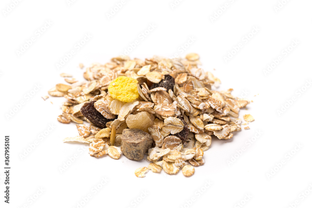 oatmeal with raisins, coconut, pineapple and banana slices isolated on a white background. For packing oatmeal or granola. oatmeal with raisins, coconut, pineapple and banana slices isolated on a white background. For packing oatmeal or granola.