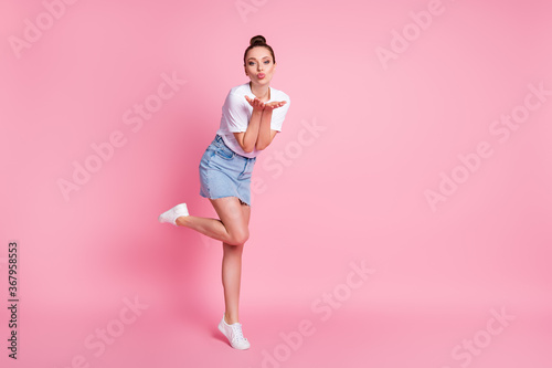 Full length photo of attractive charming girl enjoy valentine day rest relax send air kiss wear good look clothes sneakers isolated over pastel color background