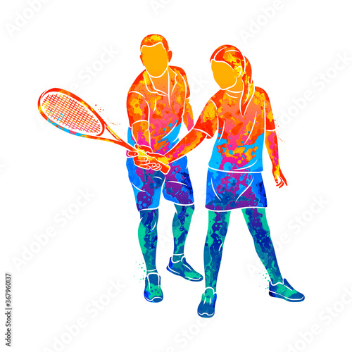 Abstract trainer helps a young woman do an exercise with a racket on her right hand in squash from splash of watercolors. Squash game training. Vector illustration of paints