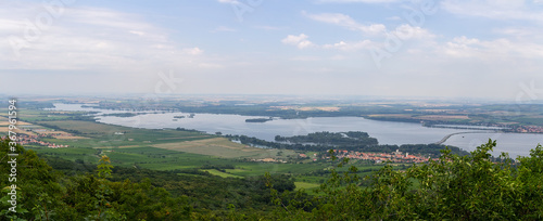 Panoramic view to reservoir Nove mlyny with small village from lookout. Palava, Czech republic