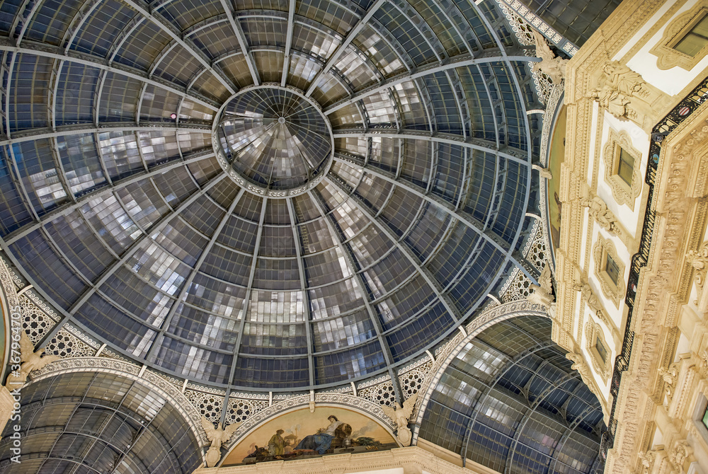 MILANO, ITALY - SEPTEMBER 2015: Galleria Vittorio Emanuele II in Milano. It's one of the world's oldest shopping malls, designed and built by Giuseppe Mengoni