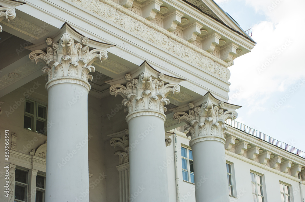 Beautiful classic facade of a building with columns in Europe Beautiful classic facade of a building with columns in Europe
