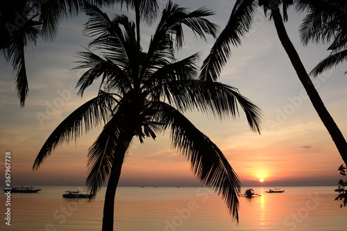 Tropical sundown. White beach. Boracay island. Western Visayas. Philippines