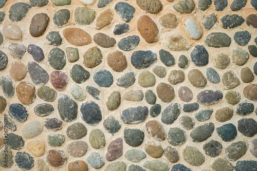Pebbles stone wall or floor background