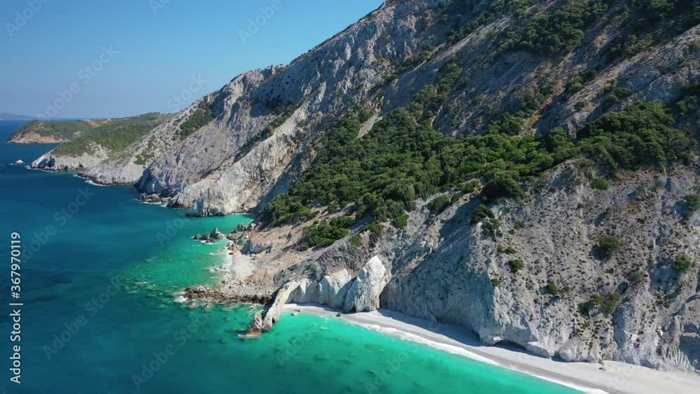 Aerial drone video of Lalaria famous turquoise beach with unique arch rock formation, one of the most beautiful in Greece, Skiathos island, Sporades islands Aerial drone video of Lalaria famous turquoise beach with unique arch rock formation, one of the most beautiful in Greece, Skiathos island, Sporades islands