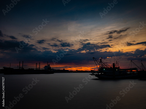 Take a photo on twilight time at harbor of Samut Sakhon Province Thailand.