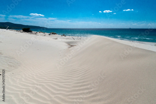 white sand in porto pino beach, sardinia