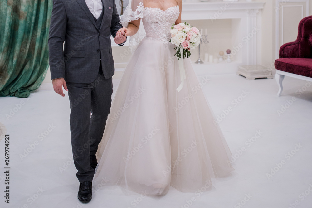 the groom with the bride in the studio the groom with the bride in the studio