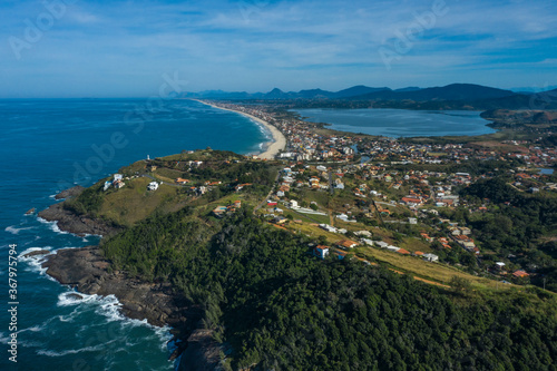Long beach, lagoon, sea and hill. Picturesque landscape. Ponta Negra Beach, City of Ponta Negra, State of Rio de Janeiro, Brazil. 